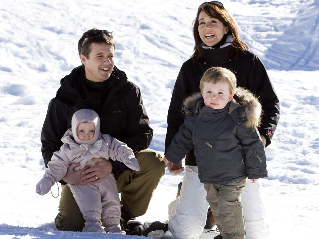 The young family pose for a photo during their annual skiing holiday in Verbier, Switzerland. Picture: Julian Parker/UK Press via Getty Images