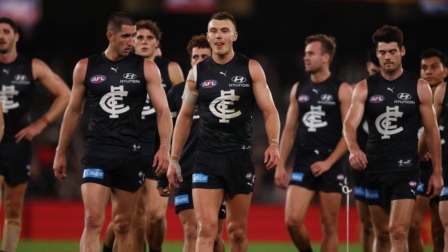 Carlton players trudge off after the loss. Picture: Michael Klein