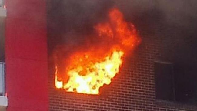 2012 tragedy: The blazing flames at the Bankstown apartment block.