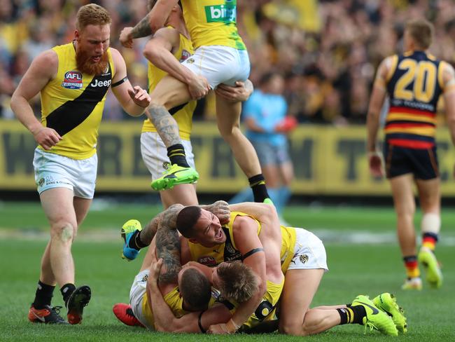 The Tigers celebrate on the final siren. Picture: Alex Coppel.