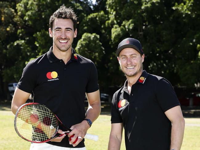 Test bowler Mitchell Starc (left) and Australian tennis great Lleyton Hewitt in Sydney on Monday for Mastercard.