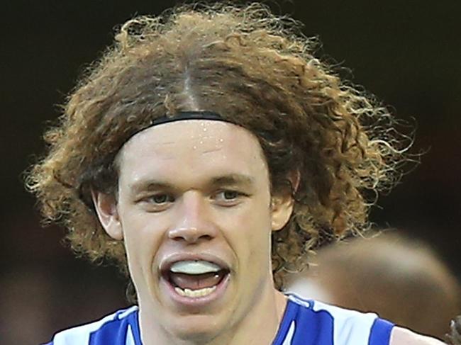 BRISBANE, QUEENSLAND - APRIL 02: Ben Brown and Brent Harvey of the Kangaroos celebrate a goal during the round two AFL match between the Brisbane Lions and the North Melbourne Kangaroos at The Gabba on April 2, 2016 in Brisbane, Australia. (Photo by Chris Hyde/Getty Images)