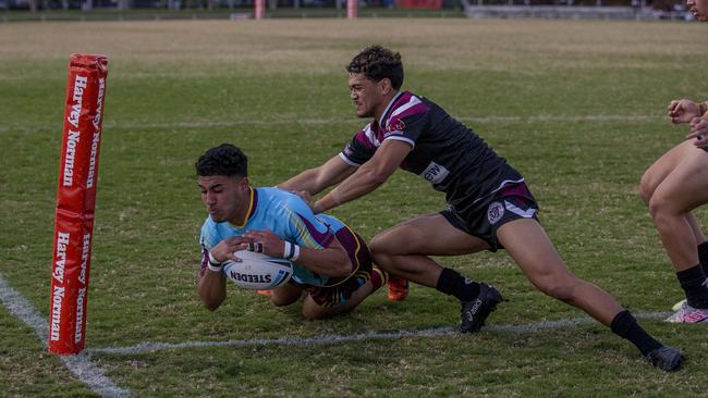 Langer Cup: Marsden SHS's George Peyroux tries to stop Keebra Park SHS's Tuvalli Khan-Pereira crossing over the line in the match against Marsden SHS at Southport Tigers home ground Owen Park on Wednesday. Picture: Jerad Williams