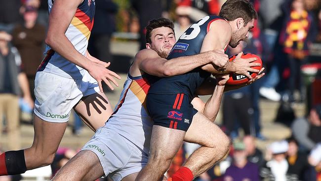 Brad Crouch tackles Timothy Webber in the SANFL on the weekend. Picture: Roger Wyman