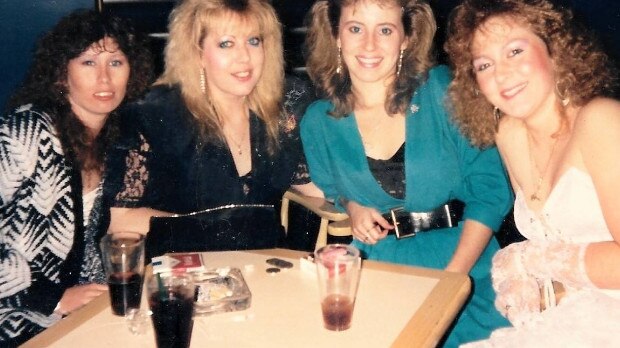 A group of friends ‘dressed up to the nines’ at Tiffany's Blacktown donning quintessential ‘80s fashion.