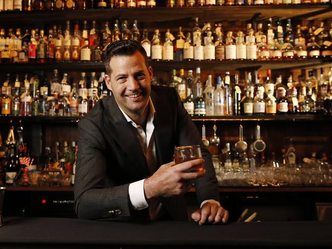 Martin Lange posing at his Savile Row bar. Picture: AAP Image/Josh Woning