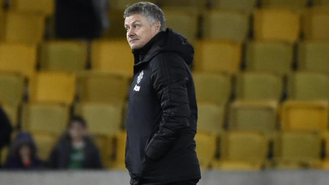 Manchester United's manager Ole Gunnar Solskjaer leaves the field at the end of the English FA Cup third round soccer match between Wolverhampton Wanderers and Manchester United at the Molineux Stadium in Wolverhampton, England, Saturday, Jan. 4, 2020. (AP Photo/Rui Vieira)