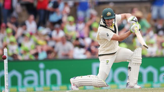 Tim Paine drives during day two of the second Test match between Australia and Sri Lanka at Manuka Oval this month. Picture. Phil Hillyard