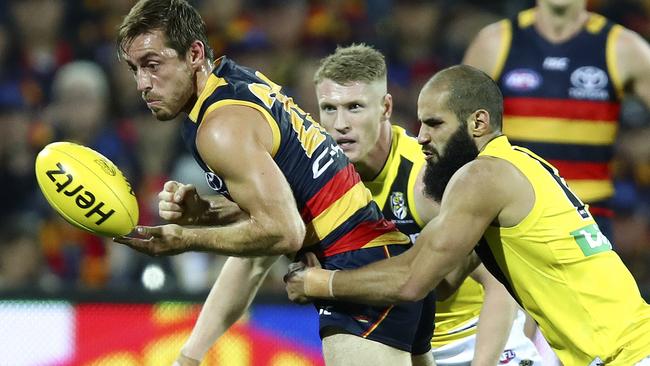 Bachar Houli AFL — Adelaide Crows v Richmond — Round 6 — at Adelaide Oval. Richard Douglas under pressure from Bachar Houli. Picture Sarah Reed