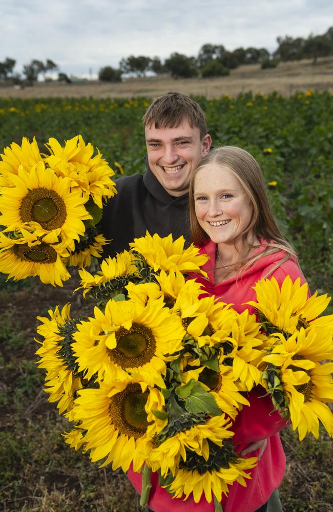 Brisbane visitors James Chisholm and Breanna Fiddyment at Warraba Sunflowers, Saturday, June 22, 2024. Picture: Kevin Farmer