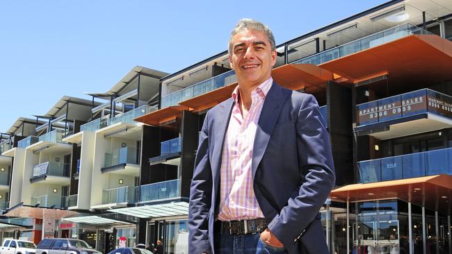 Developer Richard Antunes in front of his Baju and H20 apartments on Seaview Rd at Henley Beach.