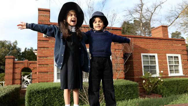 Miranda, 7, and Jeremy, 5, outside the South Melbourne Park Primary site.