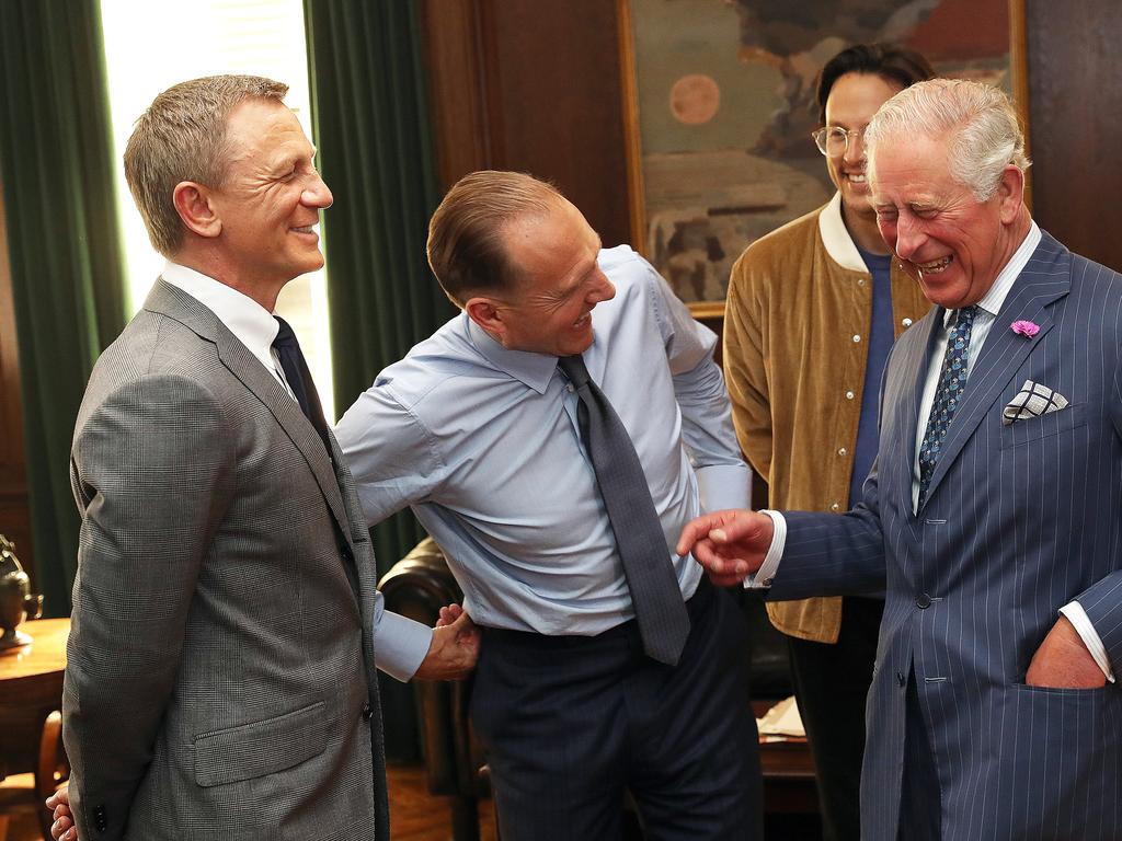 Prince Charles chats to Daniel Craig, Ralph Fiennes and director Cary Joji Fukunaga on the Bond set in June. They had a lovely time. Picture: Getty