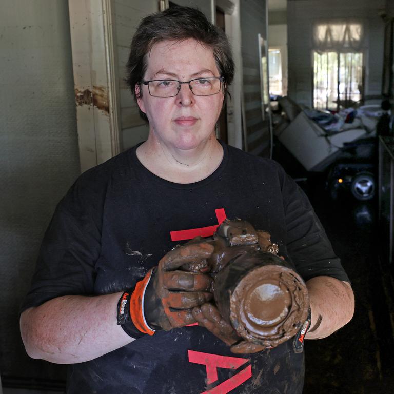 The Northern Star journalist Cath Piltz had to be evacuated from her South Lismore home and has recently returned to find the record flood waters ruined everything in her house, including her camera equipment. Picture: Toby Zerna