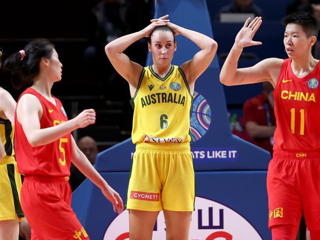 SYDNEY, AUSTRALIA - SEPTEMBER 30: Siyu Wang and Sijing Huang of China celebrate as Steph Talbot and Cayla George of Australia during the 2022 FIBA Women's Basketball World Cup Semi Final match between Australia and China at Sydney Superdome, on September 30, 2022, in Sydney, Australia. (Photo by Mark Metcalfe/Getty Images)