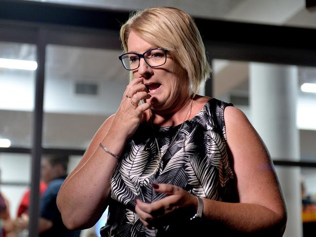 Labor Member for Mundingburra, Coralee O'Rourke sits outside the Labor Party gathering waiting for the Live Cross to ABC