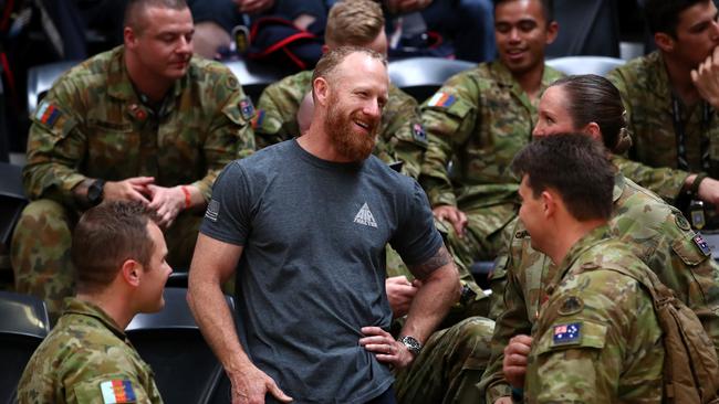 Mark Donaldson VC during the 2018 Invictus Games in Sydney talks to soldiers during the Men's Lightweight IP4 Powerlifting. Picture: Getty Images/Invictus Games Foundation