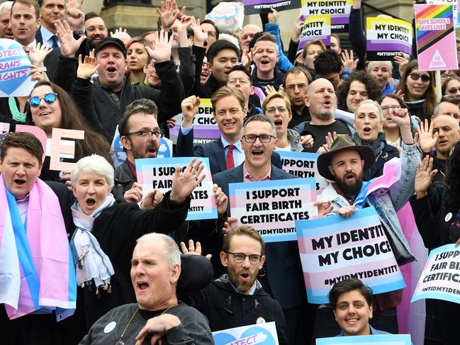 Australia Greens leader Richard Di Natale (centre) is seen with supporters of the gender diverse birth certificate bill outside of the Victorian State Parliament in 2019. Picture: AAP