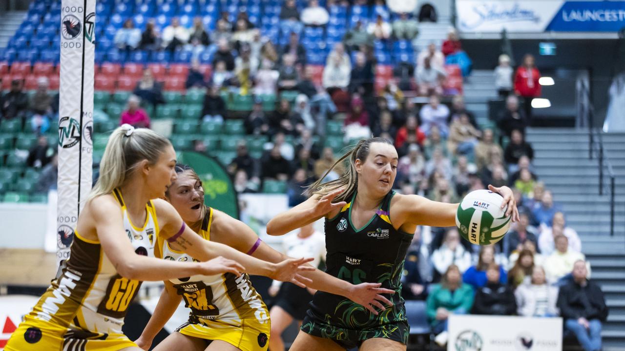 Cavalier Hayley McDougall reaches for the ball during the 2024 TNL grand final meeting between the Cavs and the Hawks. Picture: Minch Media