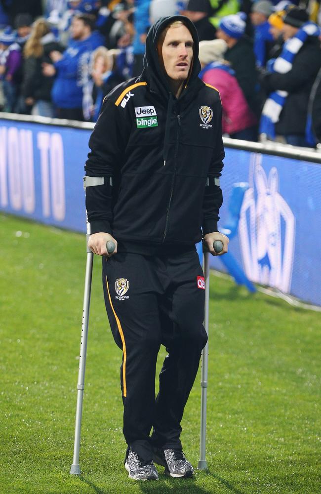 Morris on crutches after the game. Picture: Getty Images