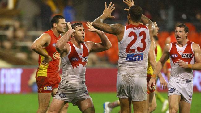 Luke Parker celebrates a goal with Lance Franklin. Picture: Adam Head