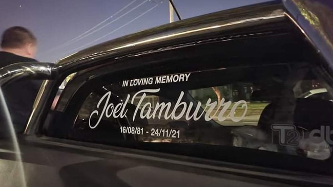 A sticker memorialising the life of Christopher Joel Tamburro.