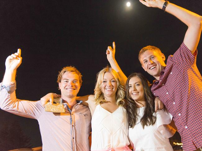 Kyle McLean, Juliana West, Jess Griffiths and Justin Webb celebrate the end of 2014 in Rye. Picture: Eugene Hyland