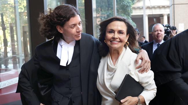 Sue Chrysanthou SC hugs Lisa Wilkinson as they emerge from court. Picture: Getty Images