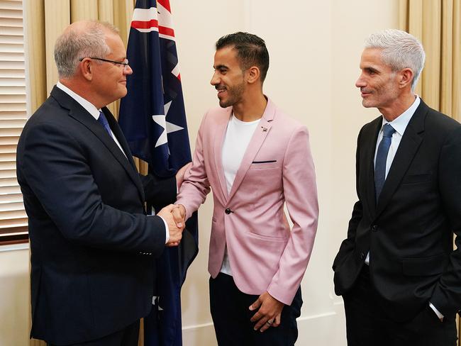 MELBOURNE, AUSTRALIA - MARCH 12: Prime Minister Scott Morrison meets with Hakeem al-Araibi at the Commonwealth Offices on March 12, 2019 in Melbourne, Australia. Bahraini refugee Hakeem al-Araibi returned to Australia on 12 February, following his release from a Thai prison. Al-Araibi was detained in November when he arrived in Thailand for his honeymoon, spending more than two months in jail while fighting extradition to Bahrain. Al-Araibi fled his home country in 2014 and was granted refugee status in Australia on the grounds he was persecuted and tortured in the Arabian Gulf state for participating in pro-democracy rallies. (Photo by Stefan Postles/Getty Images)