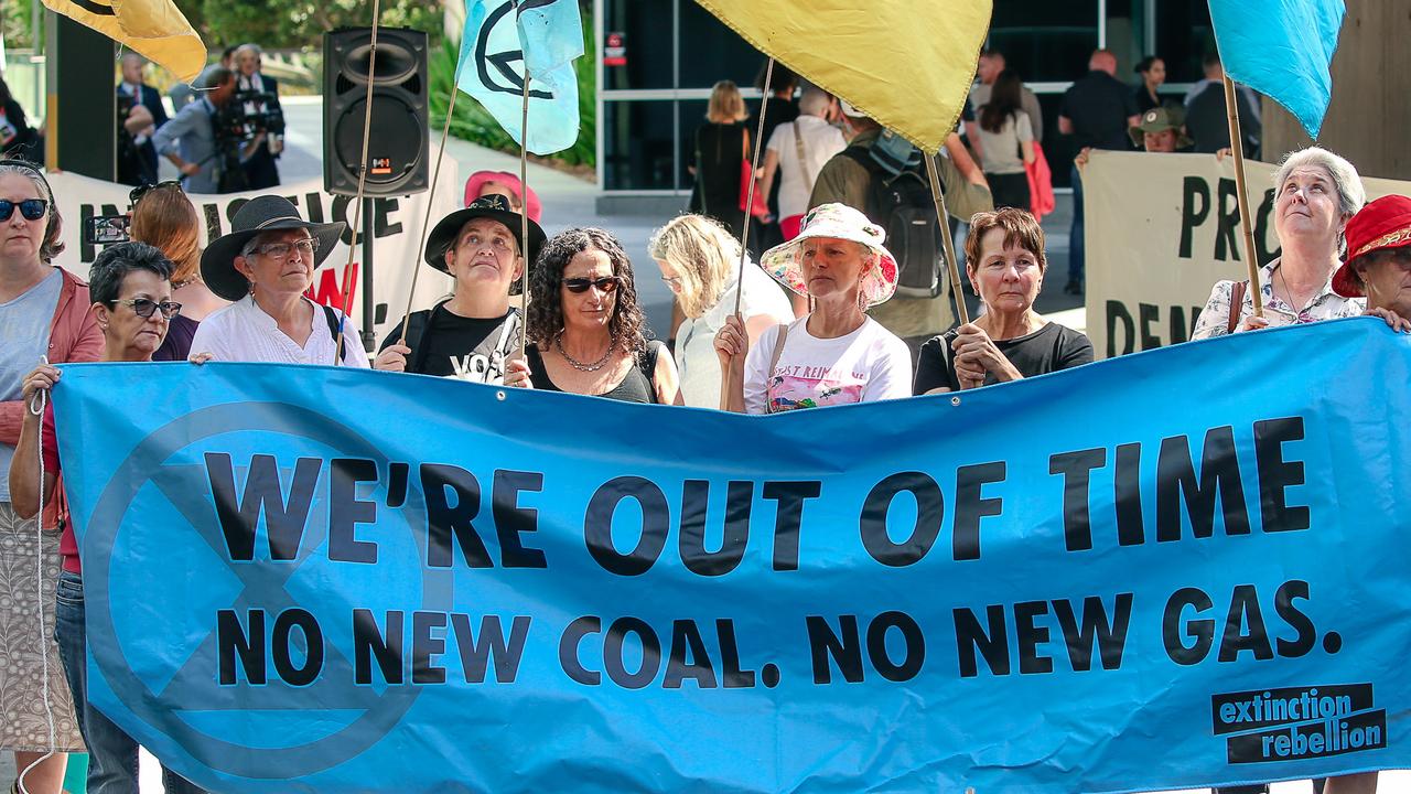 Extinction Rebellion activists protest outside Brisbane Magistrates Court. Picture: Glenn Campbell