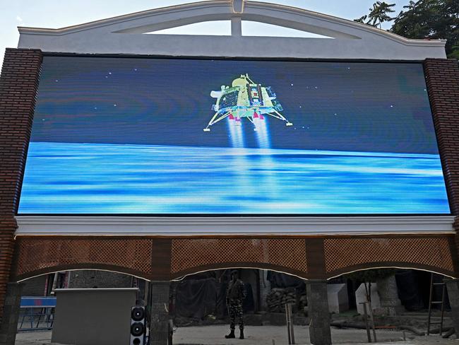 A live telecast is aired near a clock tower in Srinagar showing the Chandrayaan-3 spacecraft minutes before its successful lunar landing on the south pole. Picture: AFP