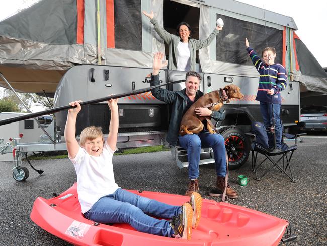 The Ryan Family from Victoria in front of their Jayco caravan ready to go as soon as they are allowed. Dad Chris, mum Tiffane and kids Flynn, 12, and Atticus, 8. .Picture: Alex Coppel.