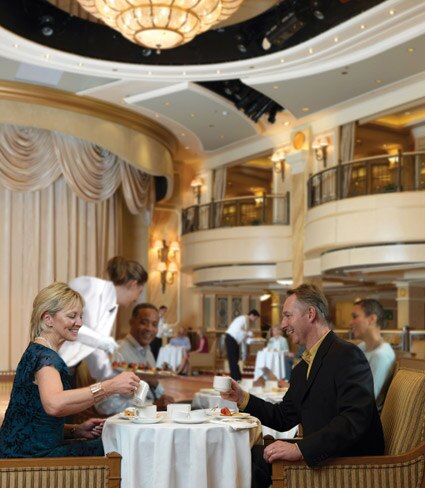 <p>The three-deck high main dining room spans the full width of the ship and has a sweeping central staircase.</p> <p>Picture: Cunard</p>