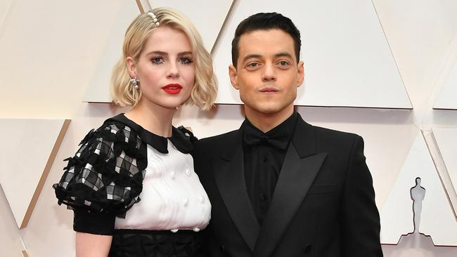 Rami Malek with partner Lucy Boynton, who he met on the set of Bohemian Rhapsody at the 2019 Oscars. Picture: Amy Sussman/Getty Images