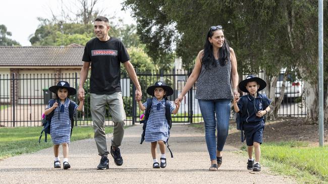 The family arrives at Hinchinbrook Public School. Picture: Monique Harmer