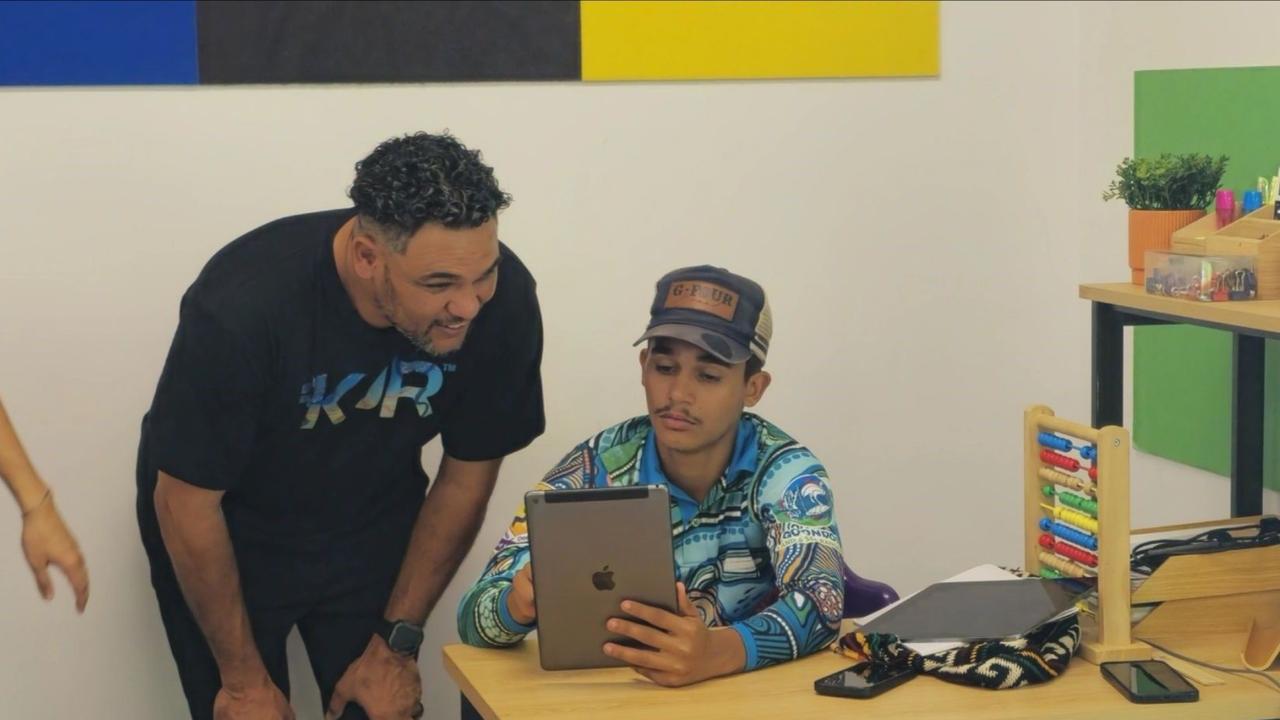 KJR Cultural Advisor John Fejo with a student at the Radiant Life College in Innisfail as part of the Age Assurance Technology Trial.