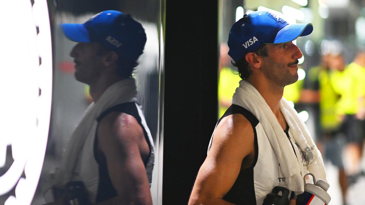 SINGAPORE, SINGAPORE - SEPTEMBER 22: 18th Placed Daniel Ricciardo of Australia and Visa Cash App RB looks on in the Paddock after the F1 Grand Prix of Singapore at Marina Bay Street Circuit on September 22, 2024 in Singapore, Singapore. (Photo by Rudy Carezzevoli/Getty Images)