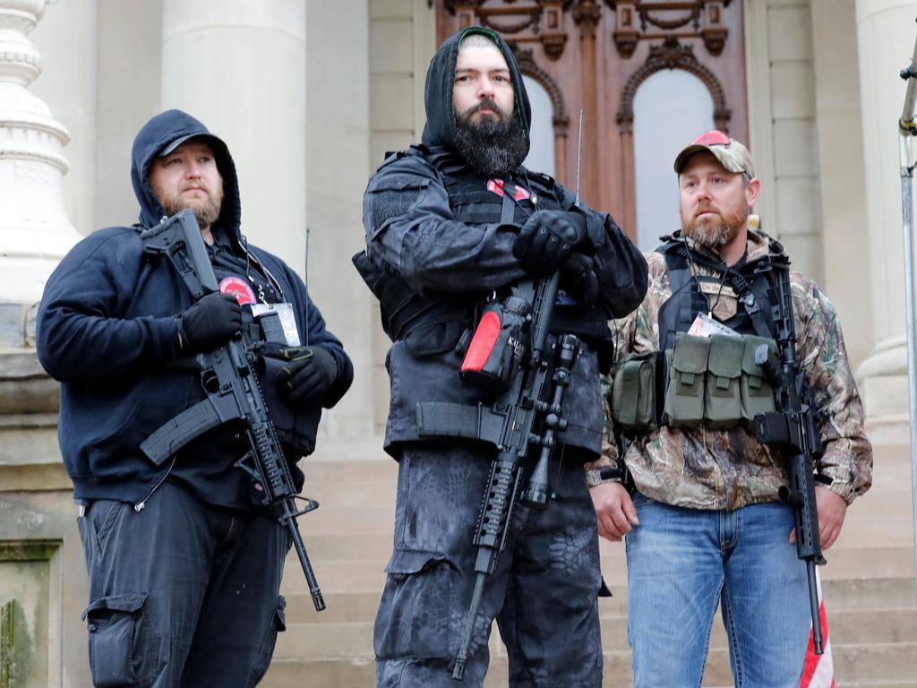 Armed protesters on the steps of the Michigan State Capitol. Picture: AFP