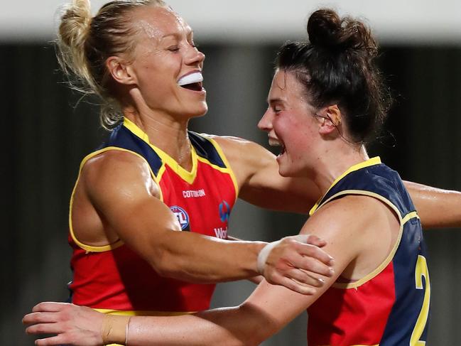 Crows co-captain Erin Phillips (left) and Eloise Jones celebrate a goal against Fremantle at Darwin’s TIO Stadium. Picture: Michael Willson/AFL Media