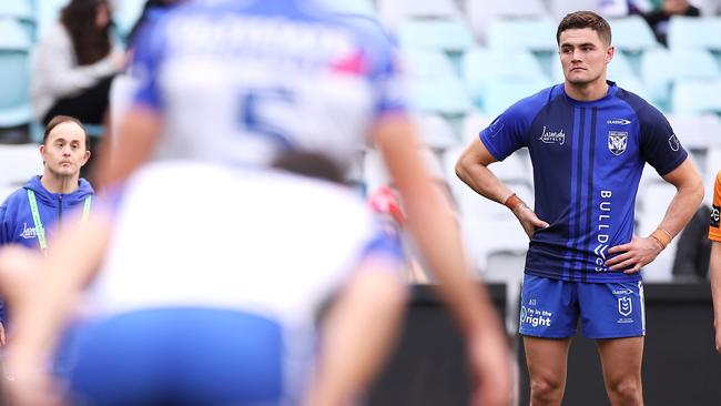 Kyle Flanagan watches on as the Bulldogs warm up for their NRL match against the Dragons on Monday afternoon. Picture: Mark Kolbe/Getty Images