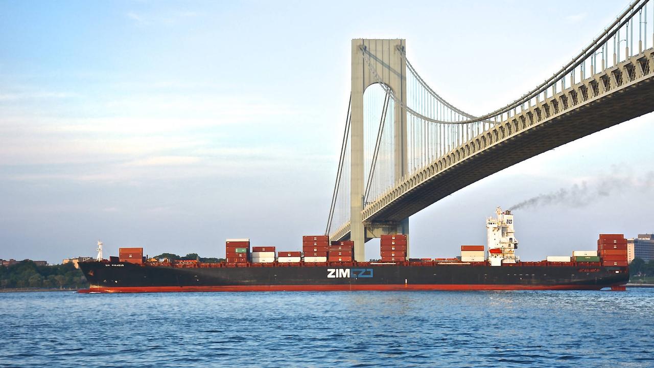 A cargo ship passes New York's Verrazano-Narrows Bridge. PHOTO: KARATZAS MARINE ADVISORS &amp; CO.