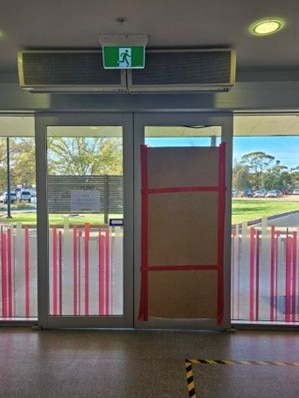 Damaged doors at Riverland Hospital after a violent incident with a patient.