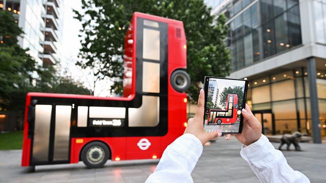 An art installation of a folded London bus by Caspar Philips is unveiled at Bishops Square, London, commissioned by Samsung. The bus is folded at 90 degrees and forms part of a wider art project, Fold Town, by Samsung to mark the release of the Samsung Galaxy Z Flip6 and Z Fold6 on July 24, 2024 in London, England. (Photo by Jeff Spicer/Getty Images for Samsung)