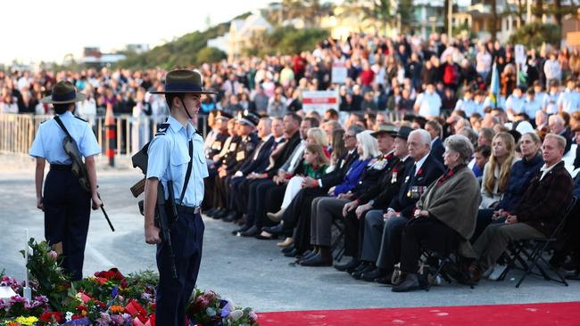 Service personnel take part in the ANZAC Dawn Service on April 25, 2024 in Currumbin, Australia. (Photo by Chris Hyde/Getty Images)