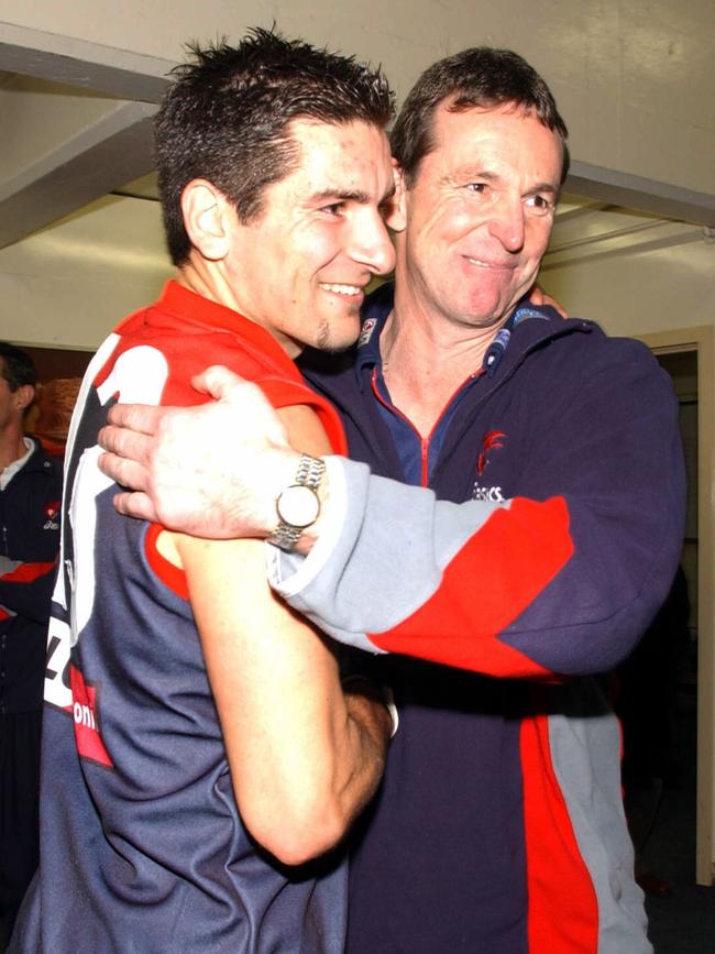 Neale Daniher and Adem Yze after Melbourne's win over St Kilda at the MCG in 2003.