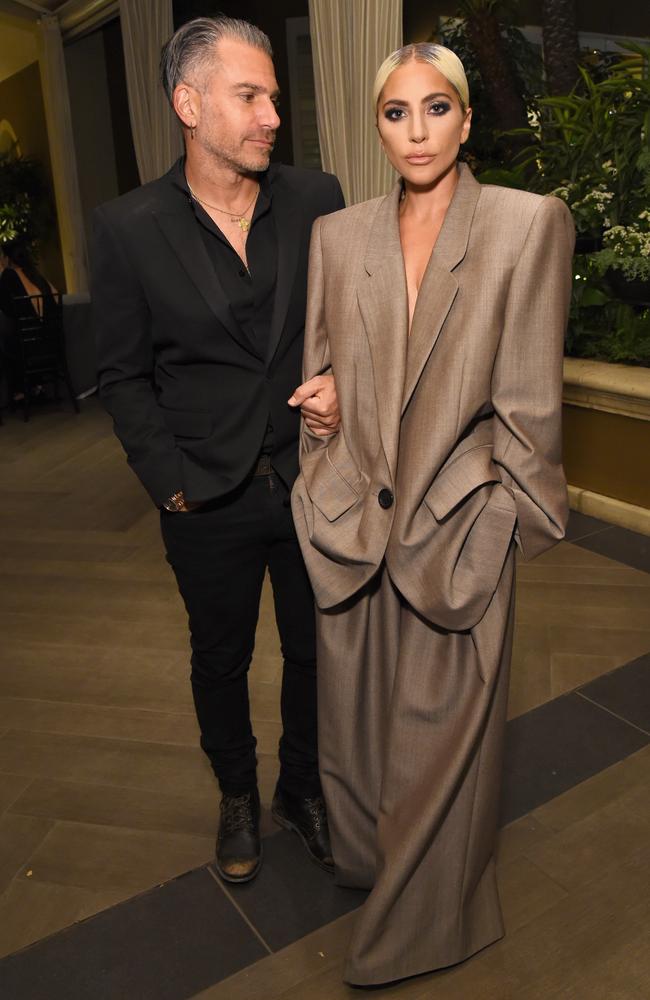 Lady Gaga and Christian Carino attend Elle’'s 25th Annual Women In Hollywood Celebration in Los Angeles. Picture: Getty Images for ELLE Magazine