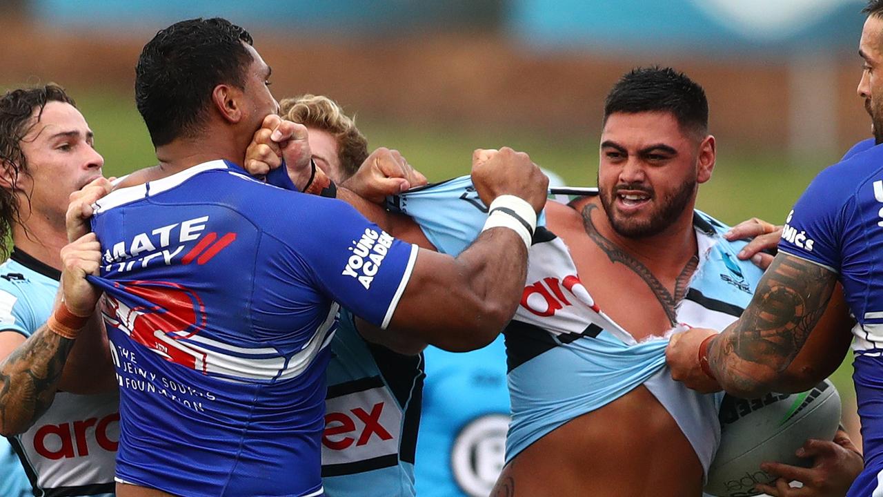 SYDNEY, AUSTRALIA - FEBRUARY 28: Royce Hunt of the Sharks and Tevita Pangai Junior of the Bulldogs tussle during the NRL Trial Match between the Cronulla Sharks and the Canterbury Bulldogs at PointsBet Stadium on February 28, 2022 in Sydney, Australia. (Photo by Mark Metcalfe/Getty Images)