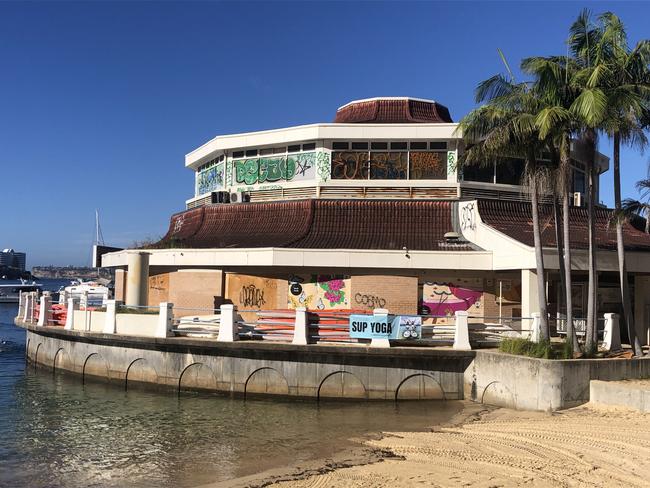 Graffiti vandalism at the former Sea Life Aquarium building in Manly Cove, Manly, on Tuesday, March 12, 2024.