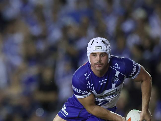 SYDNEY, AUSTRALIA - MARCH 16: Reed Mahoney of the Bulldogs looks to pass during the round two NRL match between Canterbury Bulldogs and Gold Coast Titans at Belmore Sports Ground, on March 16, 2025, in Sydney, Australia. (Photo by Jeremy Ng/Getty Images)
