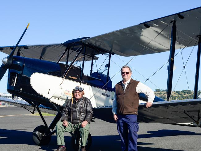 PER AERIAL MAIL: Retired builder and pilot Bill Finlen and Lismore Historian Geoff Wotherspoon with Mr Finlen's one of a kind Moth Major DH60M111 to be flown for the centenary re-enactment of Lismore's first sanctioned Air Mail Lismore to Tenterfield.